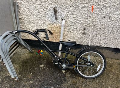 Single wheel bicycle to be attached to adults bicycle