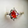 Vintage 925 Sterling Silver Ring with Central Orange Stone and Accent Stones Image 2