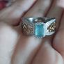 A classic ring with a  grandidierite and stones, crafted from 925 sterling silver with a platinum finish. Image 3