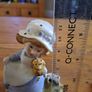 Vintage Porcelain figurine girl holding cat Image 2