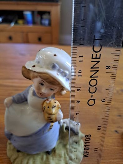 Vintage Porcelain figurine girl holding cat