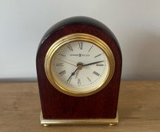 Howard Miller wooden and brass clock