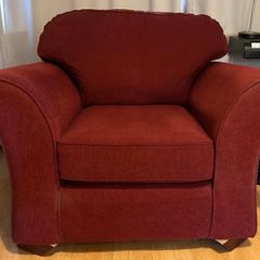 Comfortable burgundy/wine armchair