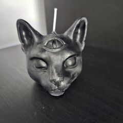 3 eyed cat candle