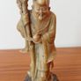 Hand-carved Chinese soapstone statue of Shou Lao the Taoist God of Longevity resting on a separate dark stone pedestal  early 20th century  height 15.5cm Image 2