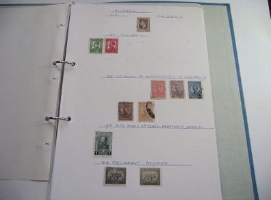 A collection of stamps from various countries on pages in binder (1880s-1990s)