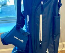 NEW - TaylorMade FlexTech Stand Bag (Black/Blue), stand legs still have the factory wrapping on them.