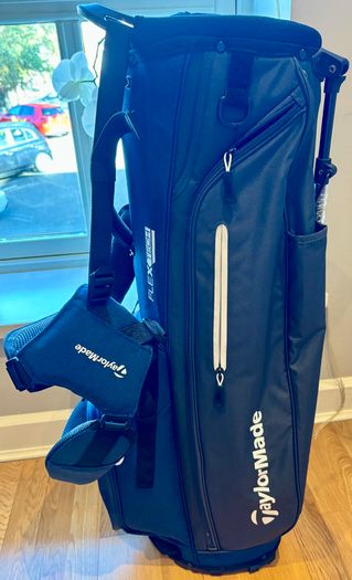 NEW - TaylorMade FlexTech Stand Bag (Black/Blue), stand legs still have the factory wrapping on them.