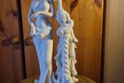 Vintage Lady and A Peacock Sculpture