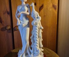 Vintage Lady and A Peacock Sculpture