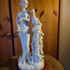 Vintage Lady and A Peacock Sculpture
