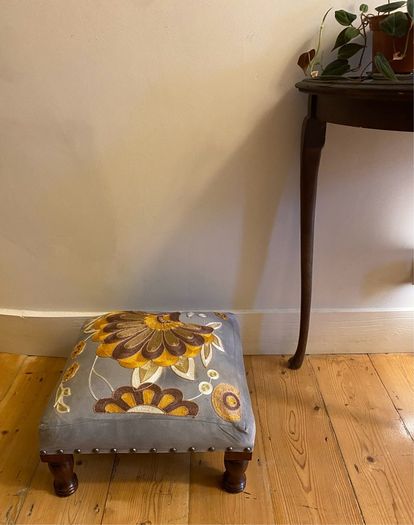 Decorative Grey upholstered footstool mustard embroidery wooden legs