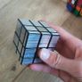 Collection of various puzzle cubes Image 8