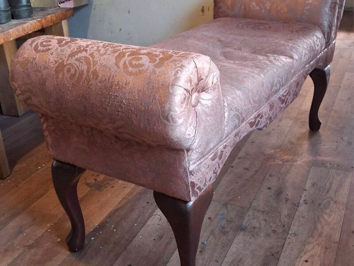 very old small type sofa