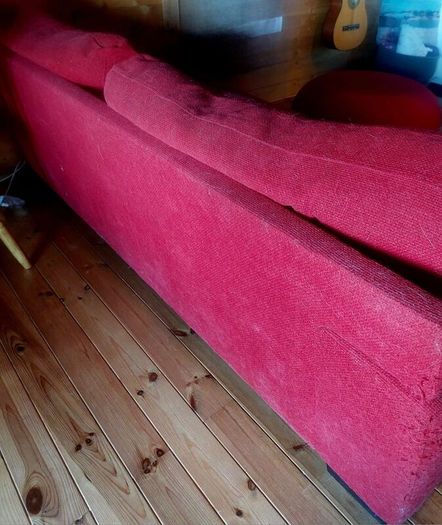 Red sofa and footstool