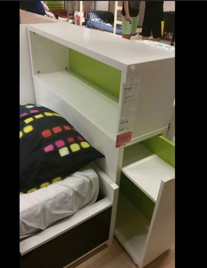 Ikea Flaxa bed with storage headboard.
