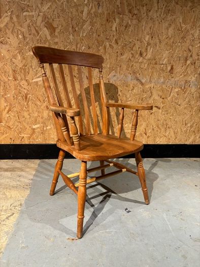 A Late Victorian farmhouse armchair.