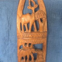 Hand-carved wooden wall hanging