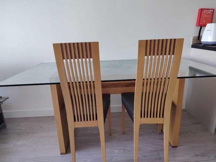 Grey fabric sofa and glass top dining table set