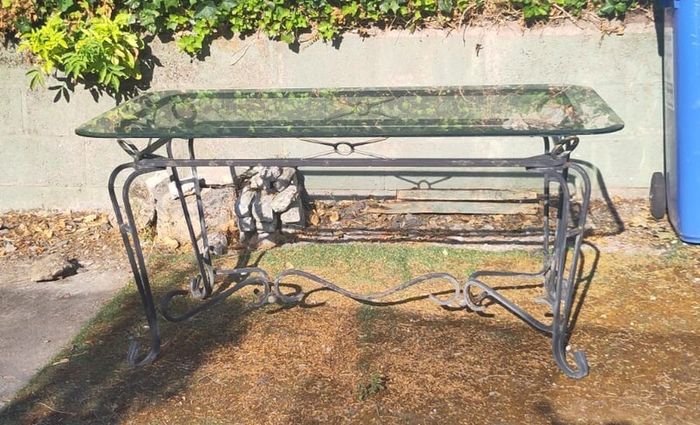 Garden table with glass top