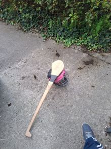 hurling helmet and hurl