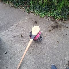 hurling helmet and hurl