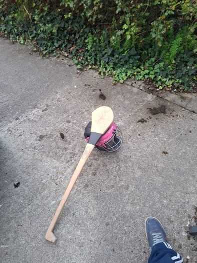 hurling helmet and hurl