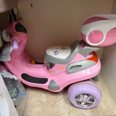 Girls ride on motor bike