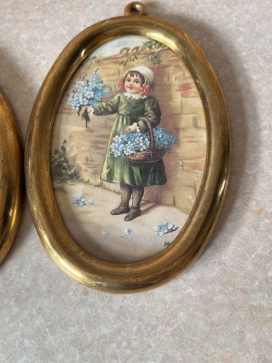 Vintage Pair Wall oval Brass frames features a young girl holding flowers