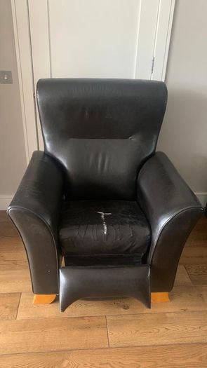 Bespoke solid armchair in need of repair