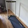 Folding Treadmill with remote control and manually adjustable incline. Image 2