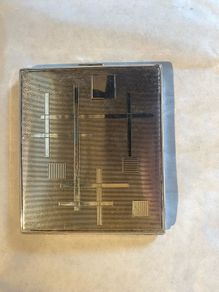cigarette or card caseThis is a mid-century modern silver-plated cigarette case featuring an abstract, geometric grid and line pattern.