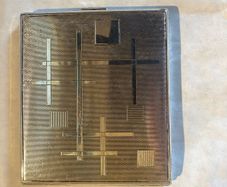 cigarette or card caseThis is a mid-century modern silver-plated cigarette case featuring an abstract, geometric grid and line pattern.