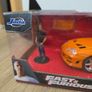 Jada Toys Fast & Furious 1995 Toyota Supra 1:24 Diecast Model Car with Brian Figure - New in Box Image 2