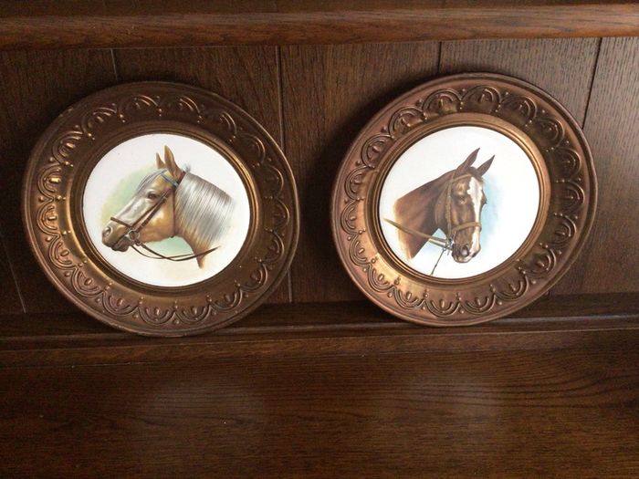 A pair of 10 inch copper wall hanging horses head plaques with hangers