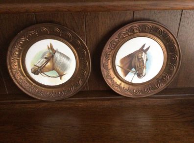A pair of 10 inch copper wall hanging horses head plaques with hangers
