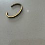 Calvin Klein black and gold bangle Image 4