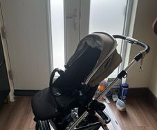silvercross pram with cot and raincover