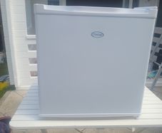 small fridge . with ice box