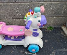 Kids ride on toy that turns into scooter