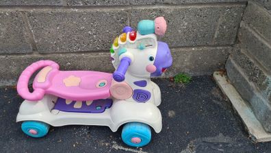 Kids ride on toy that turns into scooter