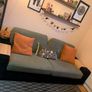 Green 3 seater sofa with matching footrest Image 2