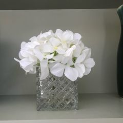 artifical white hydrangea flower and glass vase