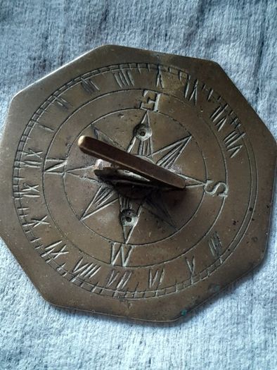 old miniature sundial