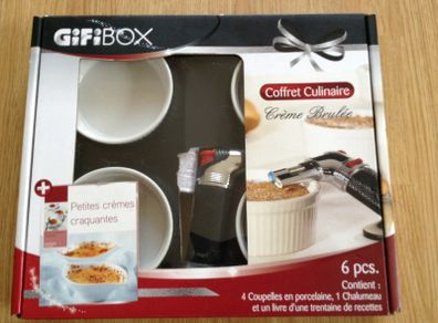Culinary blowtorch with porcelain dishes, including recipe book