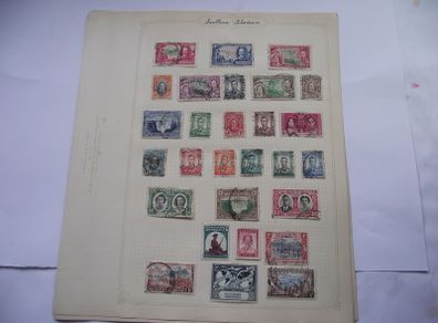 A collection of stamps from Northern Rhodesia, Southern Rhodesia, Rhodesia, South Africa and Nyasaland on loose pages