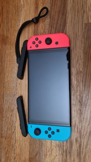 Nintendo Switch OLED Neon and accessories