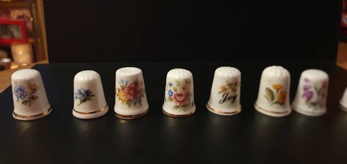 Collection of Flower Themed Gold Coloured Edged Thimbles