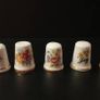 Collection of Flower Themed Gold Coloured Edged Thimbles Image 5