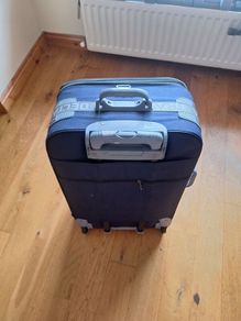 Luggage- Large second hand planne luggage- suitcase.